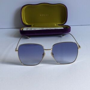 Gucci  GG1031s 004 Women's Gold Frame Sunglasses with Blue Gradient Lenses